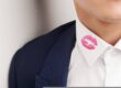 pink kiss mark on man's collar